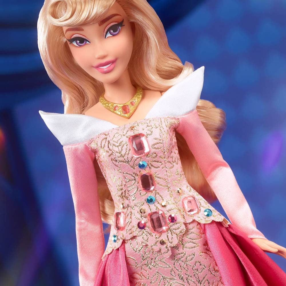 The jewels on her bodice are inspired by the Storybook from the opening of the film.